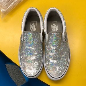 Vans sparkley slip ons.